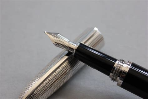 louis vuitton carved silver ink pen prices